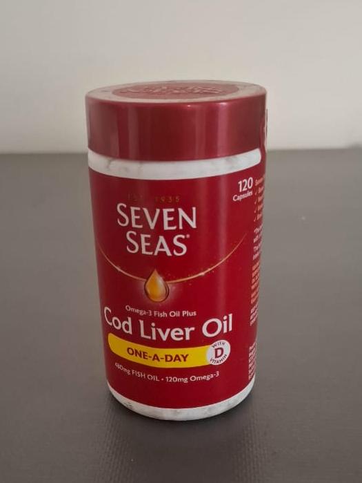 Seven Seas Cod Liver Oil Capsules supplement bottle containing Omega 3, Vitamin A and Vitamin D for heart, brain, bone and immune health support.